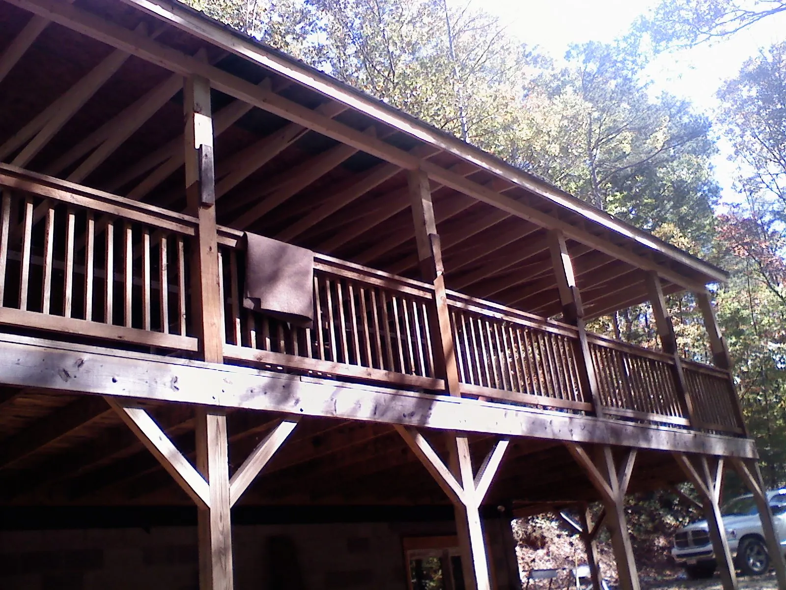 Timber framing under a new elevated porch and deck — Roof Leak Repair in East Taunton by Roofing Brothers
